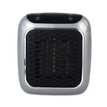 AeroHeat ceramic room heater, front view showing honeycomb grille and top control panel