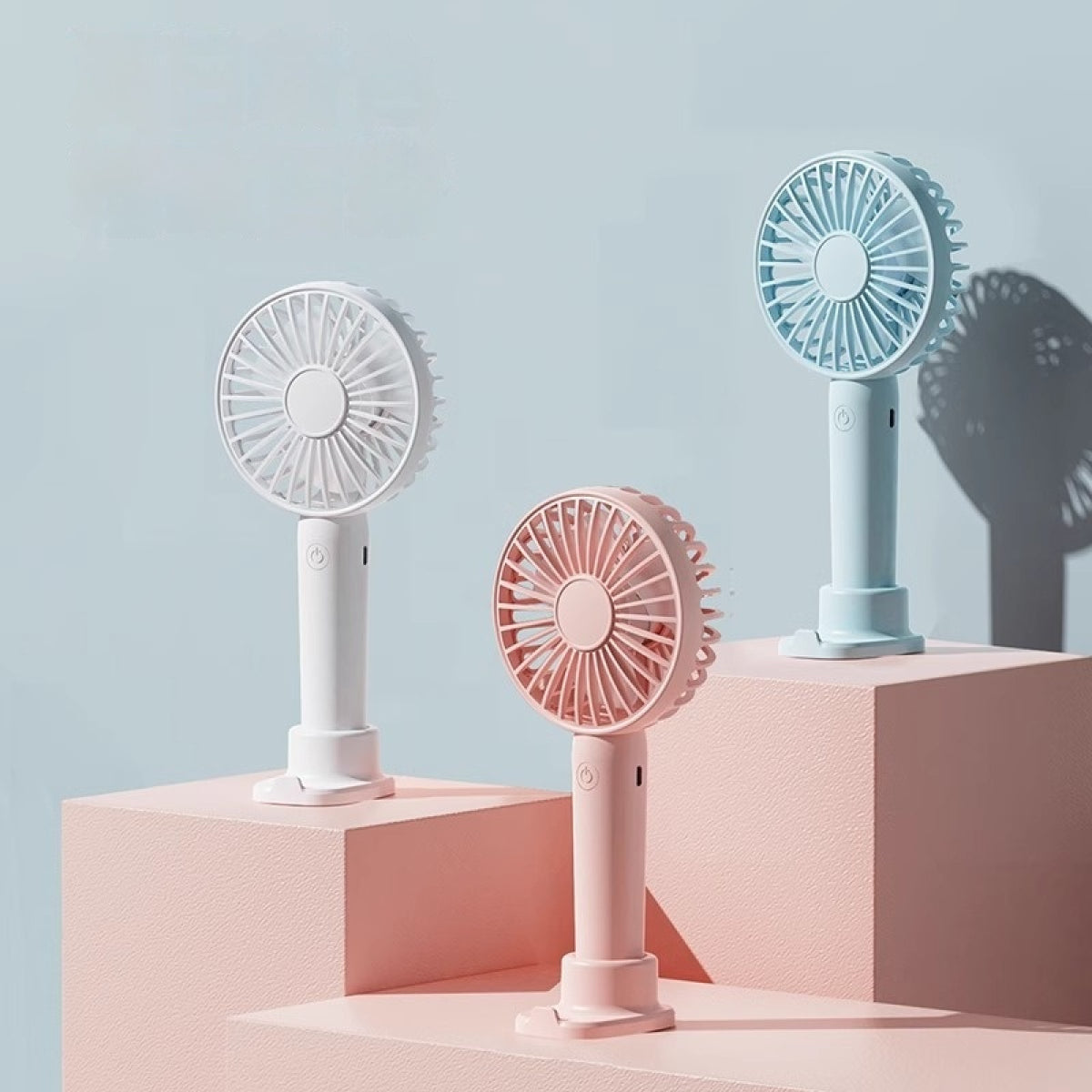 AeroBreeze Handheld Fan — Pocket Cooling & Phone Stand