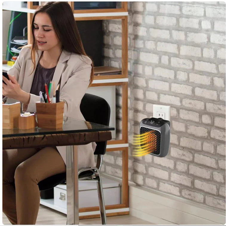 AeroHeat ceramic room heater plugged into a wall socket at home