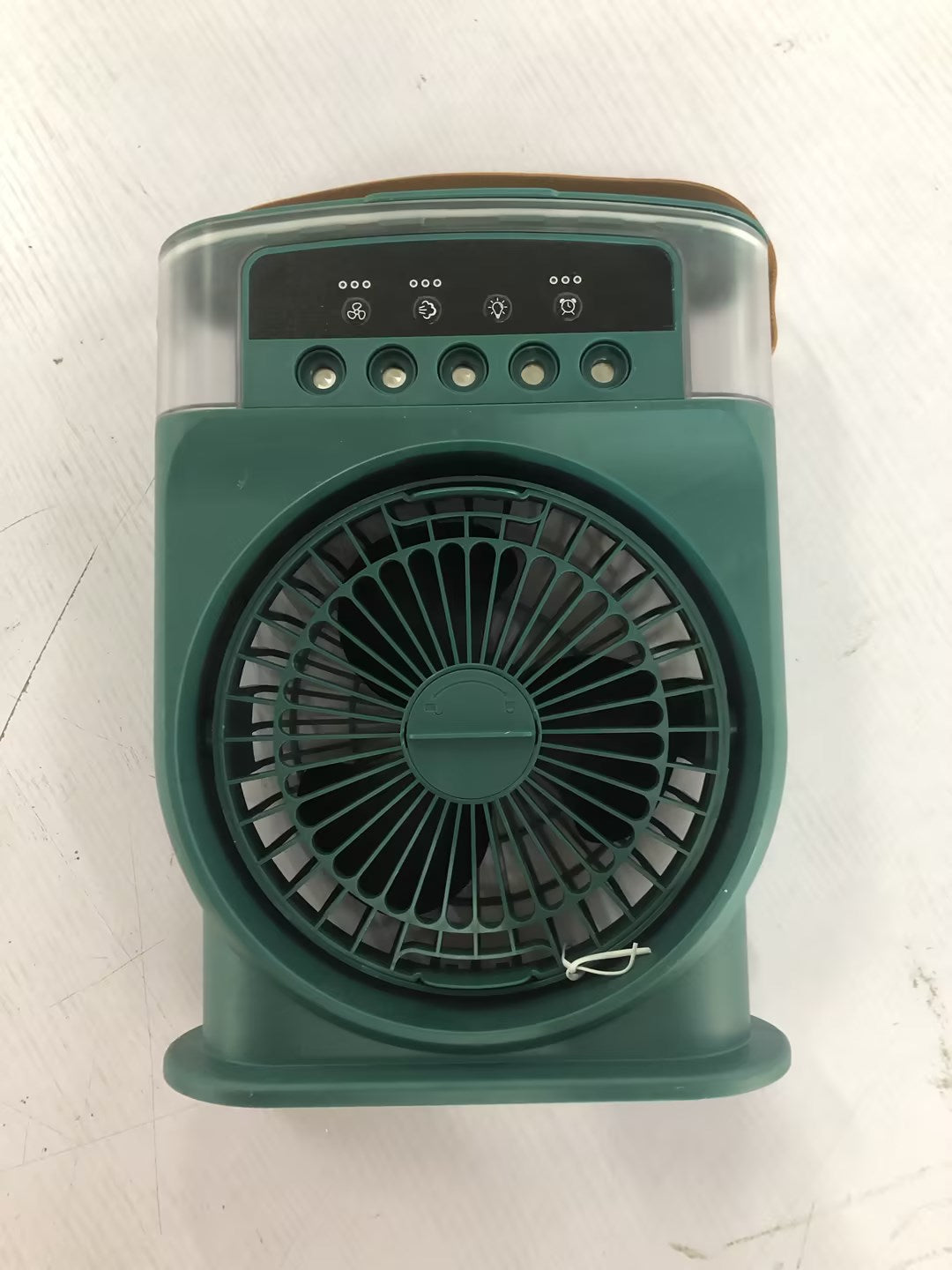 AeroMist portable air cooler fan close-up, showing fan grille and top control panel
